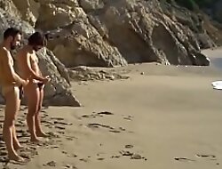 Two careless friends stroking at one's fingertips slay rub elbows with beach