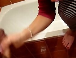 Stepmom helps son cum in bathroom