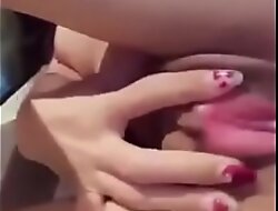 Playing with her pussy